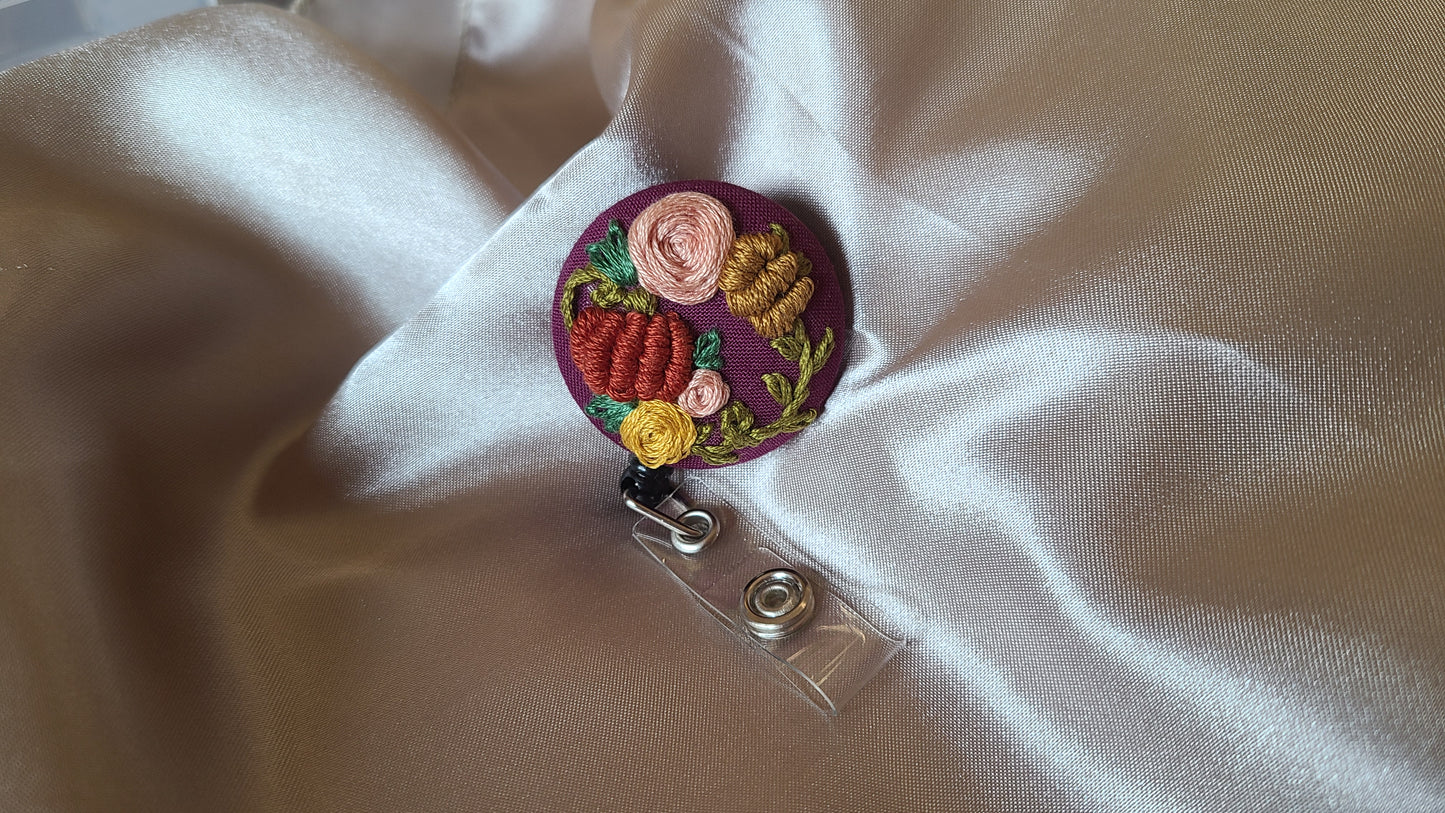 Golden Spice Pumpkin Wreath on Dark Plum Hand Embroidered Retractable Badge Reel - Little Love Parcels