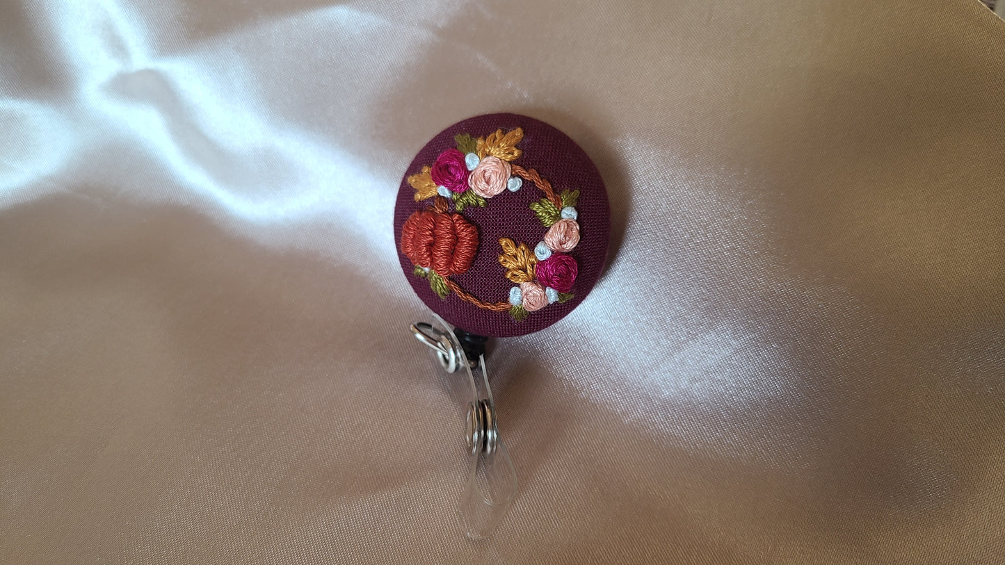 Mini Spiced Pumpkin Floral Wreath on Maroon Hand Embroidered Retractable Badge Reel