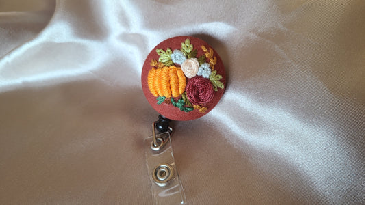 Dusty Pink Rose with Large Orange Pumpkin Wreath on Pumpkin Spice Orange Hand Embroidered Retractable Badge Reel - Little Love Parcels